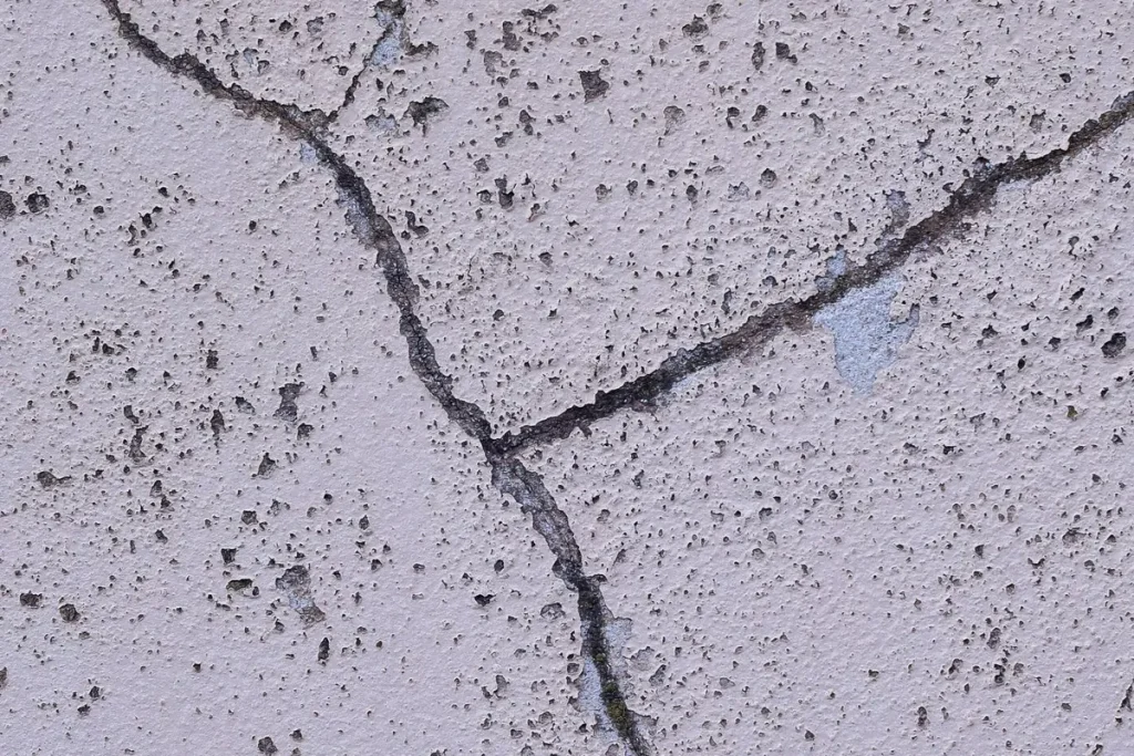 Diagonal crack in a concrete surface, foundation crack inspection