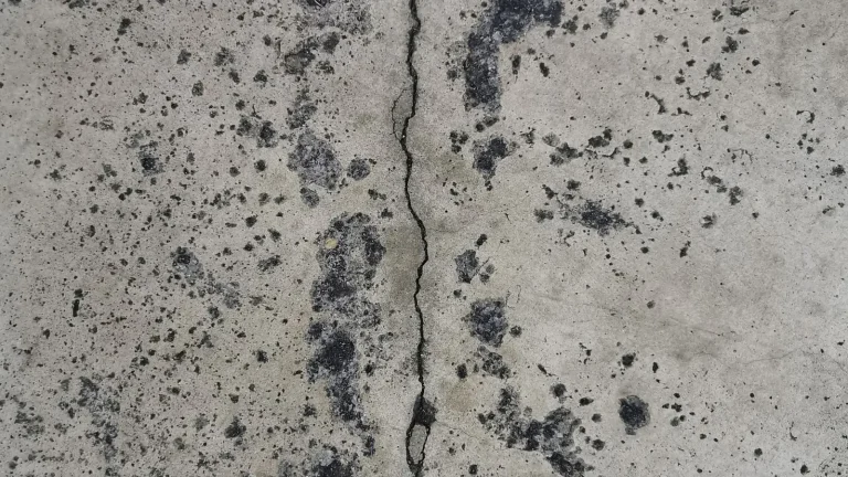 Vertical crack with staining on concrete, foundation inspection in Columbia, MO