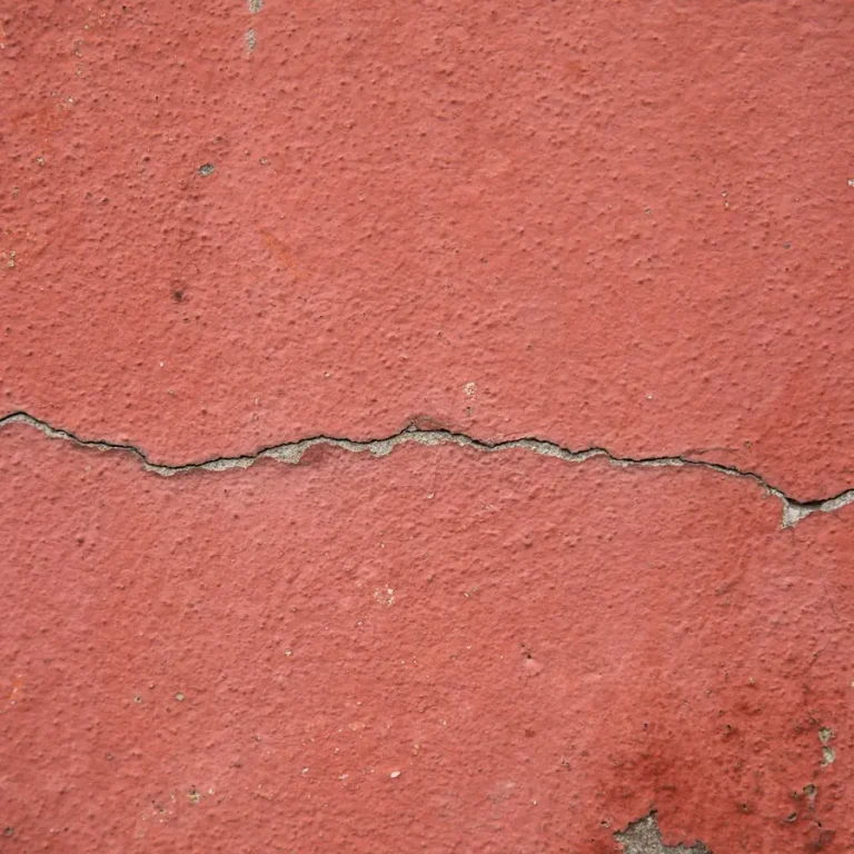 Horizontal crack across a painted wall, foundation settlement